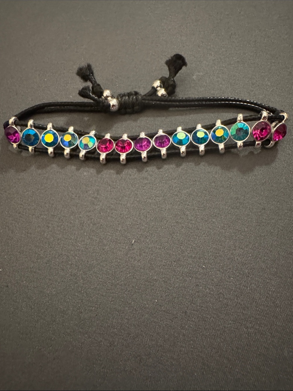 Bomb Party Adjustable Black Cord Bracelet with multi color Crystal Accents